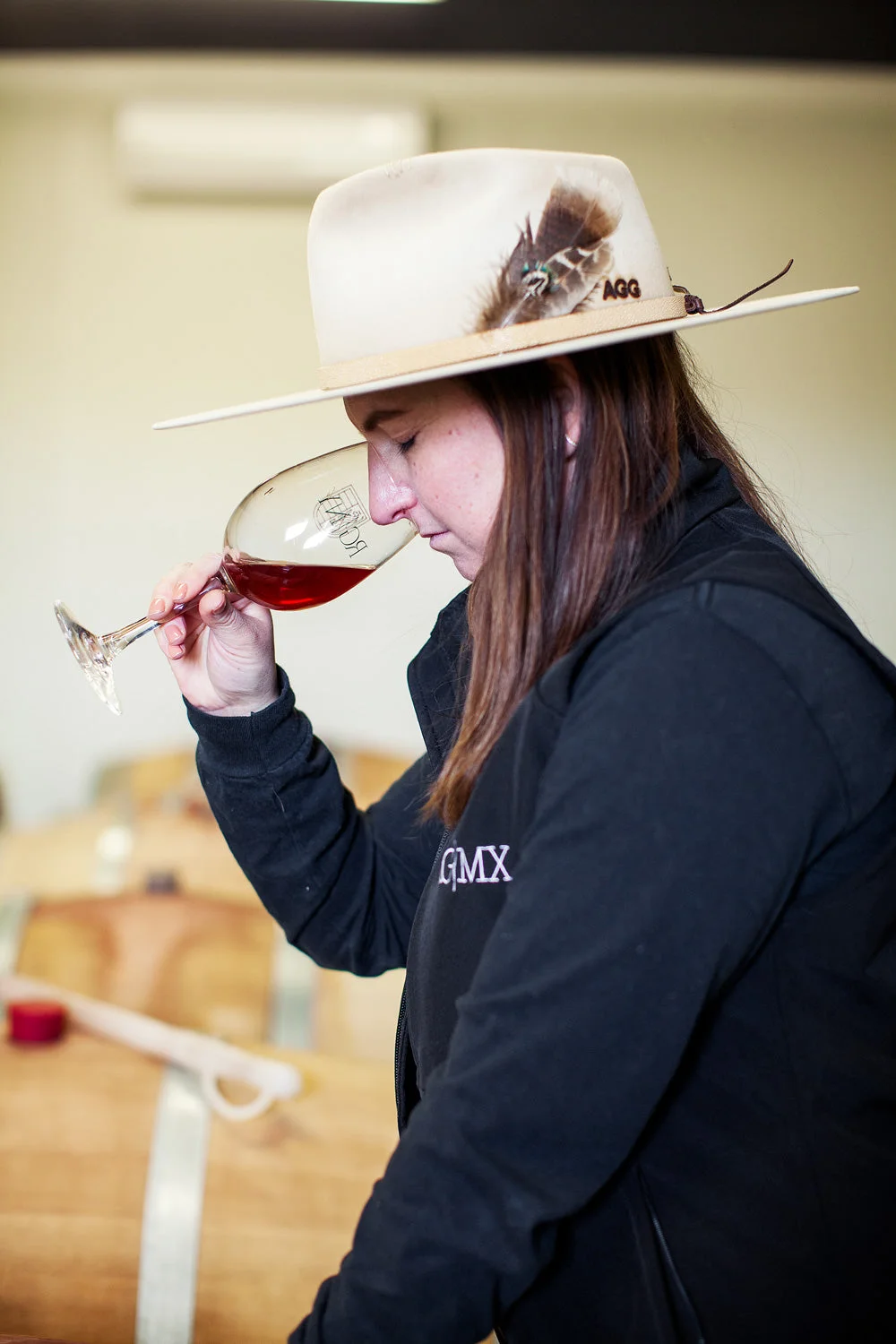 woman with nice hat smelling wine RG|NY