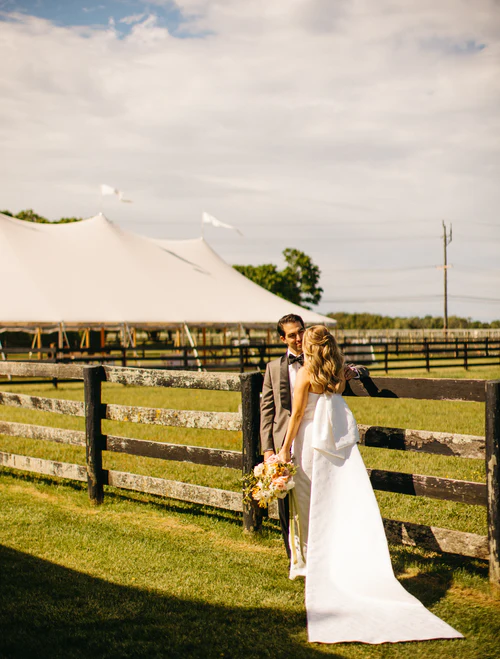 bride and groom talking by the horse stables RG|NY